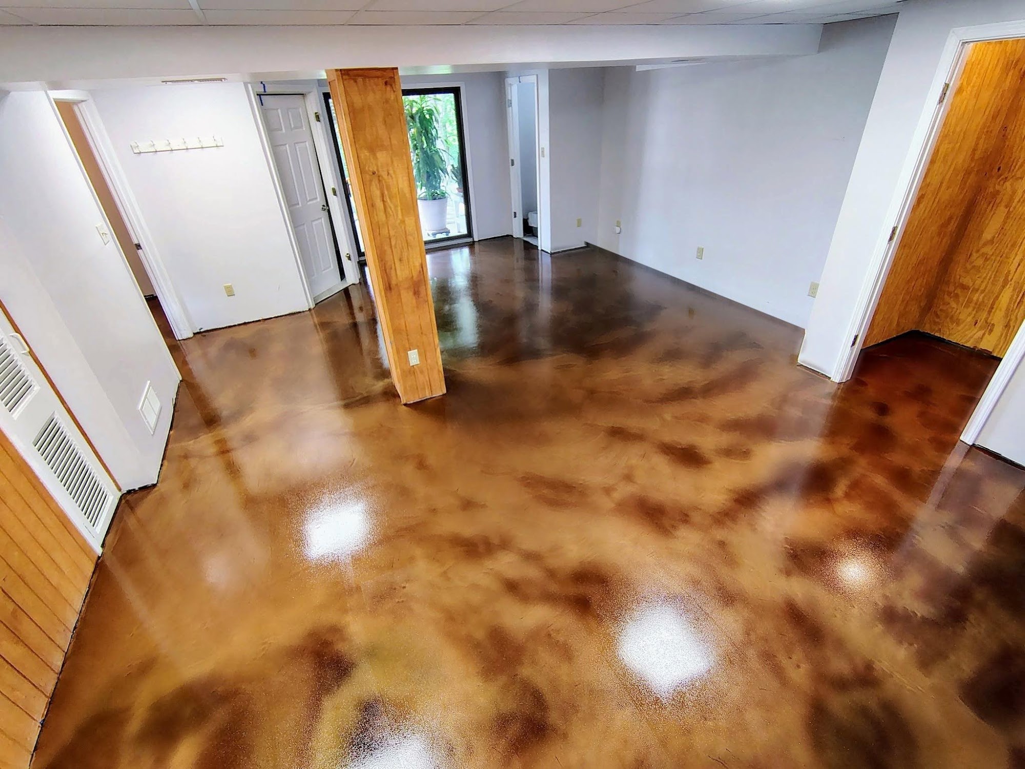Brown metallic epoxy floor in a basement